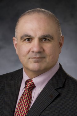 Dr. Kouros Owzar
